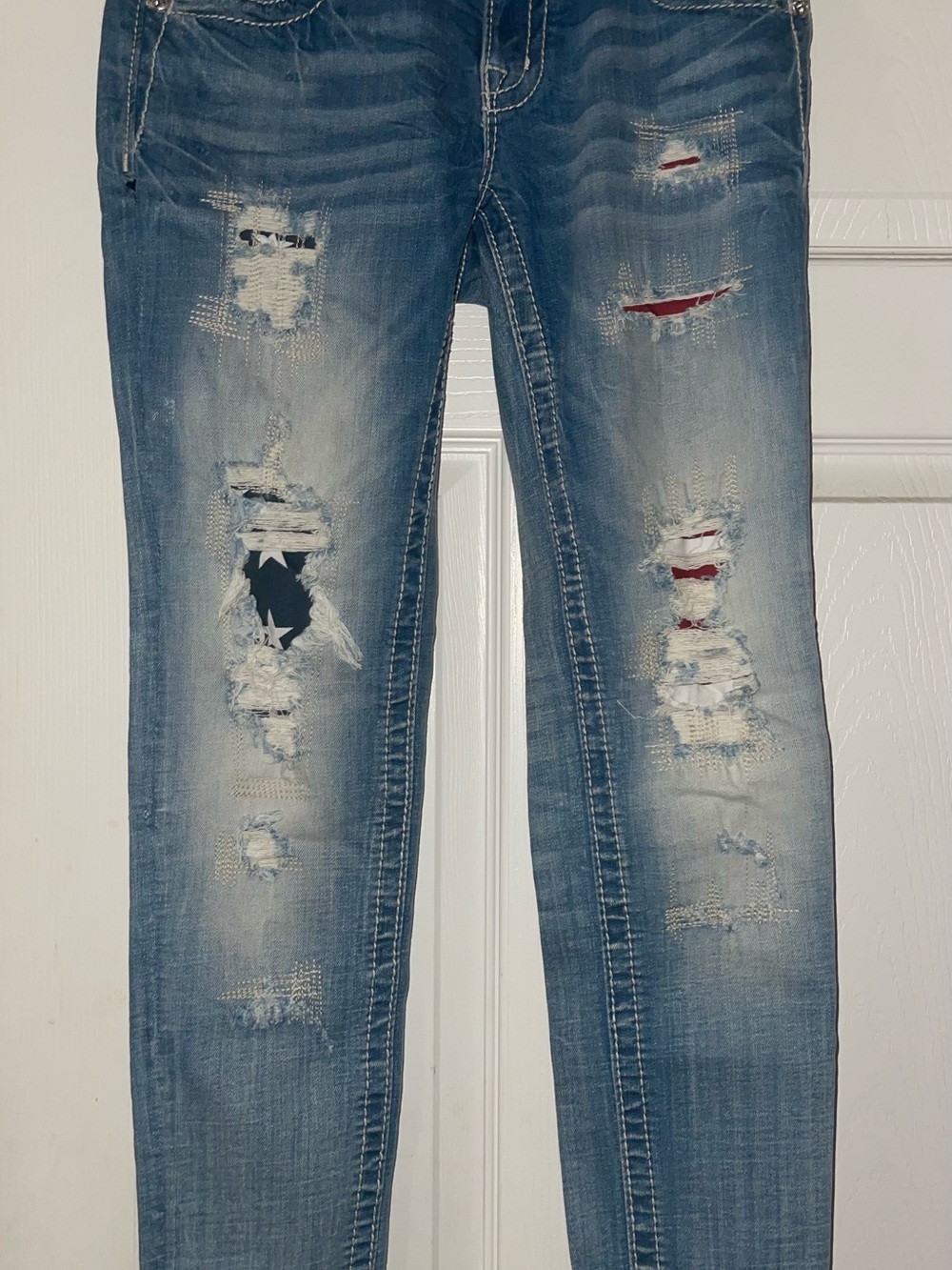 Miss Me Light Blue Distressed Ankle Jeans with Red Patch Detail